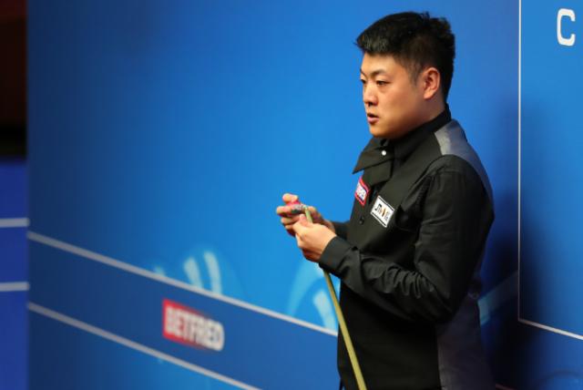 辉达官方平台-世锦赛梁文博再负罗伯逊 马奎尔成首位出局种子